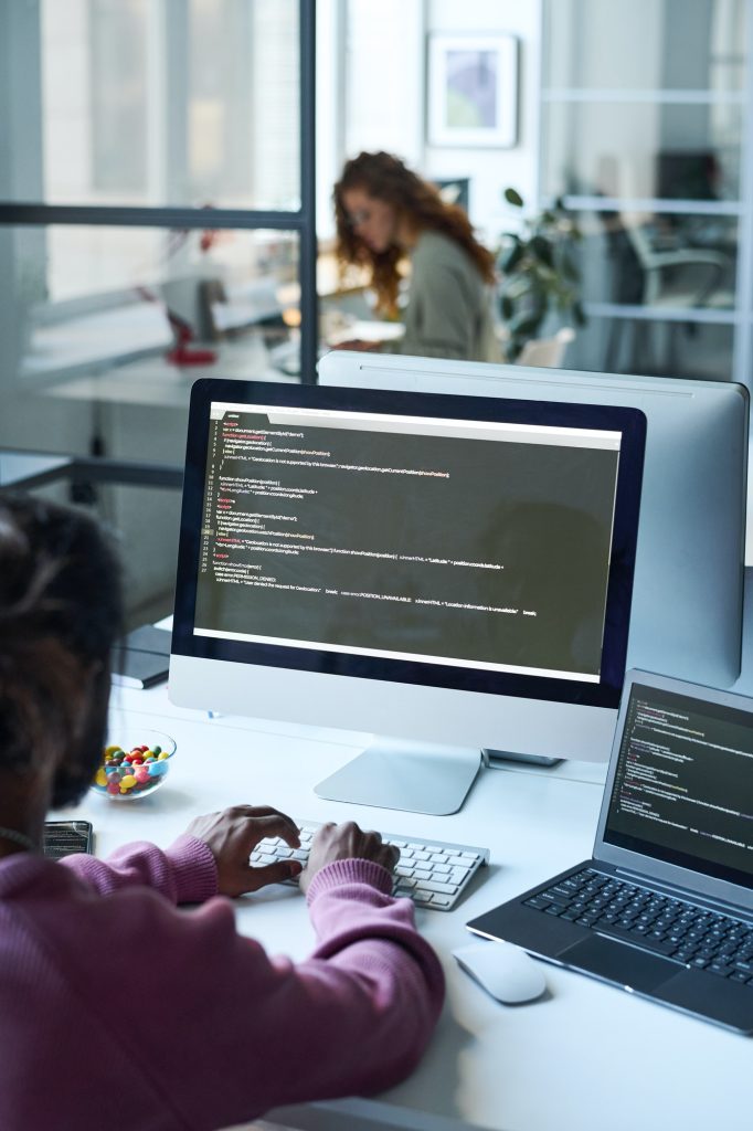 Man working with codes on computer